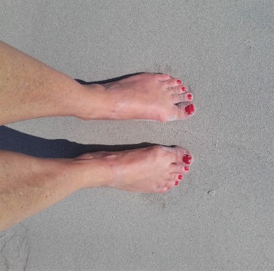 Bare feet in the sand